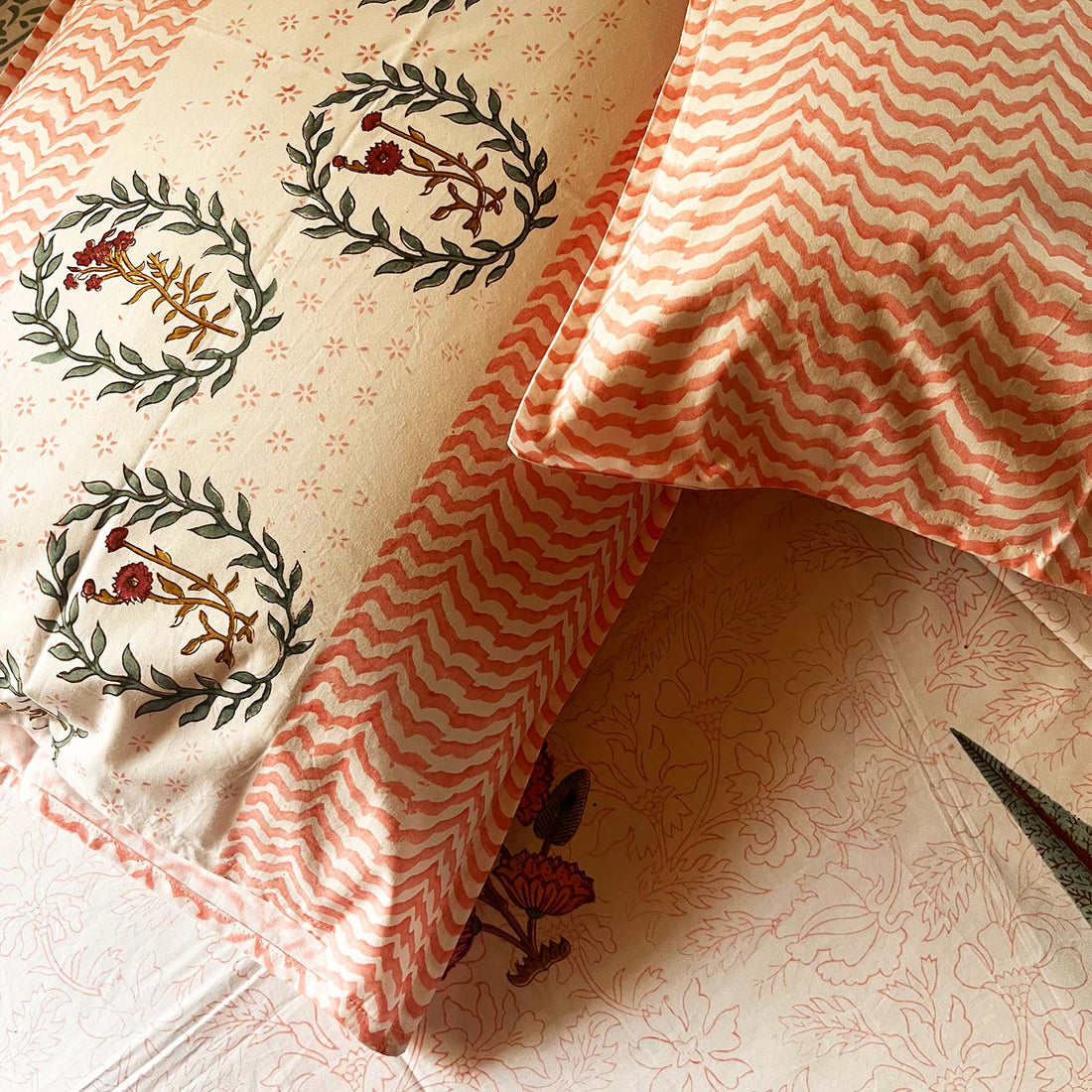 Orange Floral Block Printed Cotton Double Bedsheet Set With 2 Pillow Covers - 108 inches x 108 inches