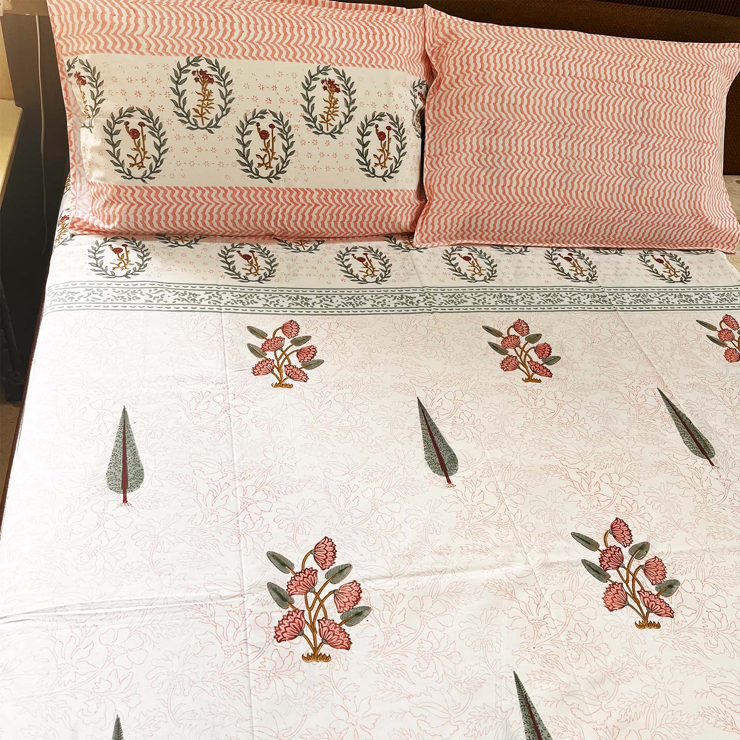 Orange Floral Block Printed Cotton Double Bedsheet Set With 2 Pillow Covers - 108 inches x 108 inches