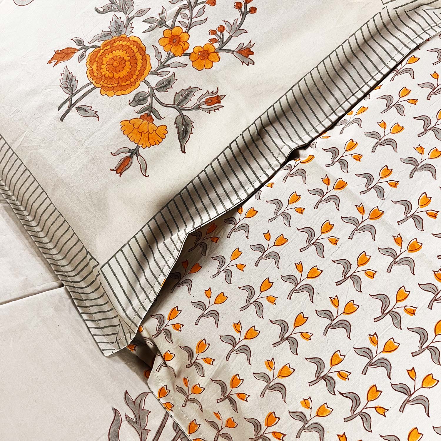 White and Yellow Floral Block Printed Cotton Double Bedsheet Set With 2 Pillow Covers - 108 inches x 108 inches