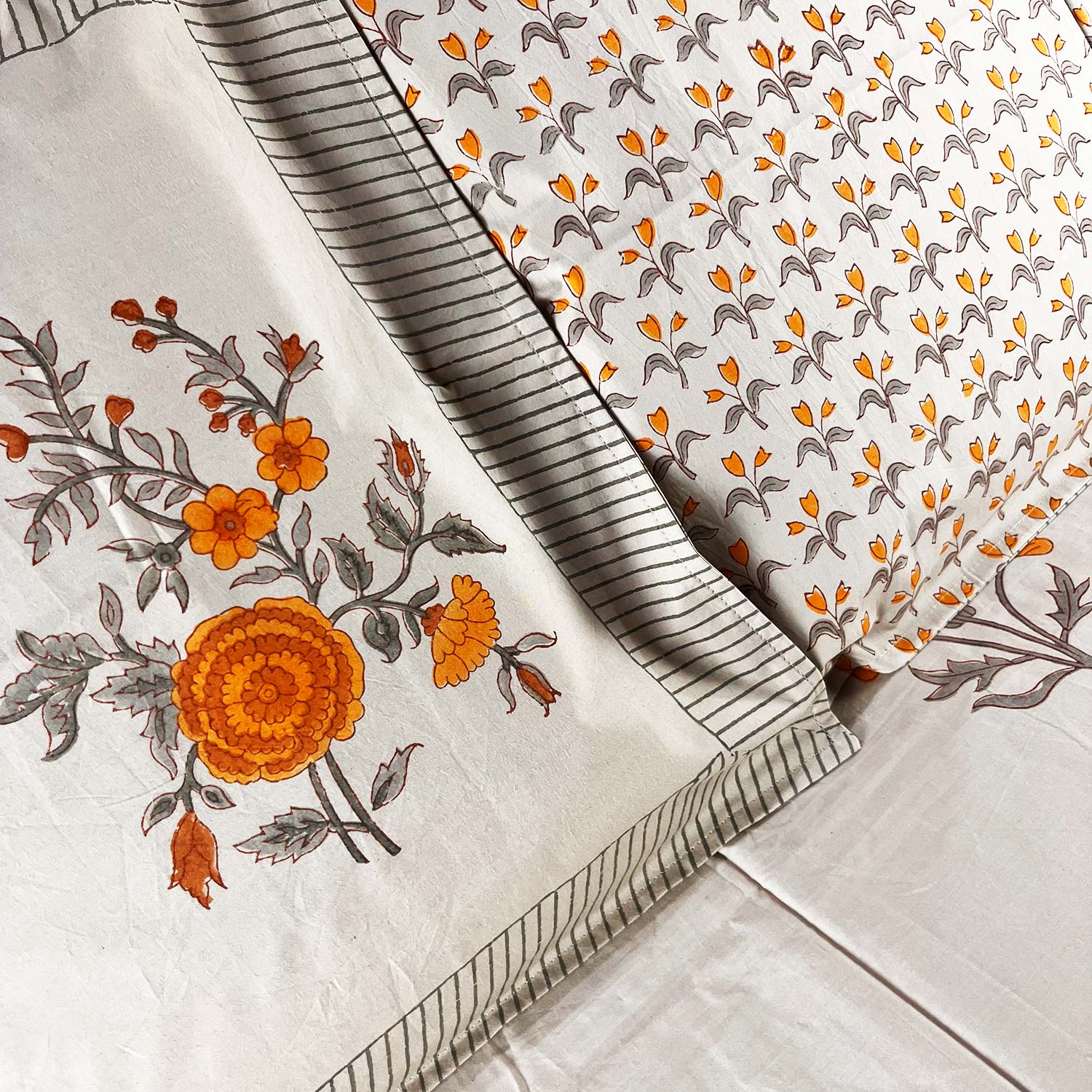 White and Yellow Floral Block Printed Cotton Double Bedsheet Set With 2 Pillow Covers - 108 inches x 108 inches