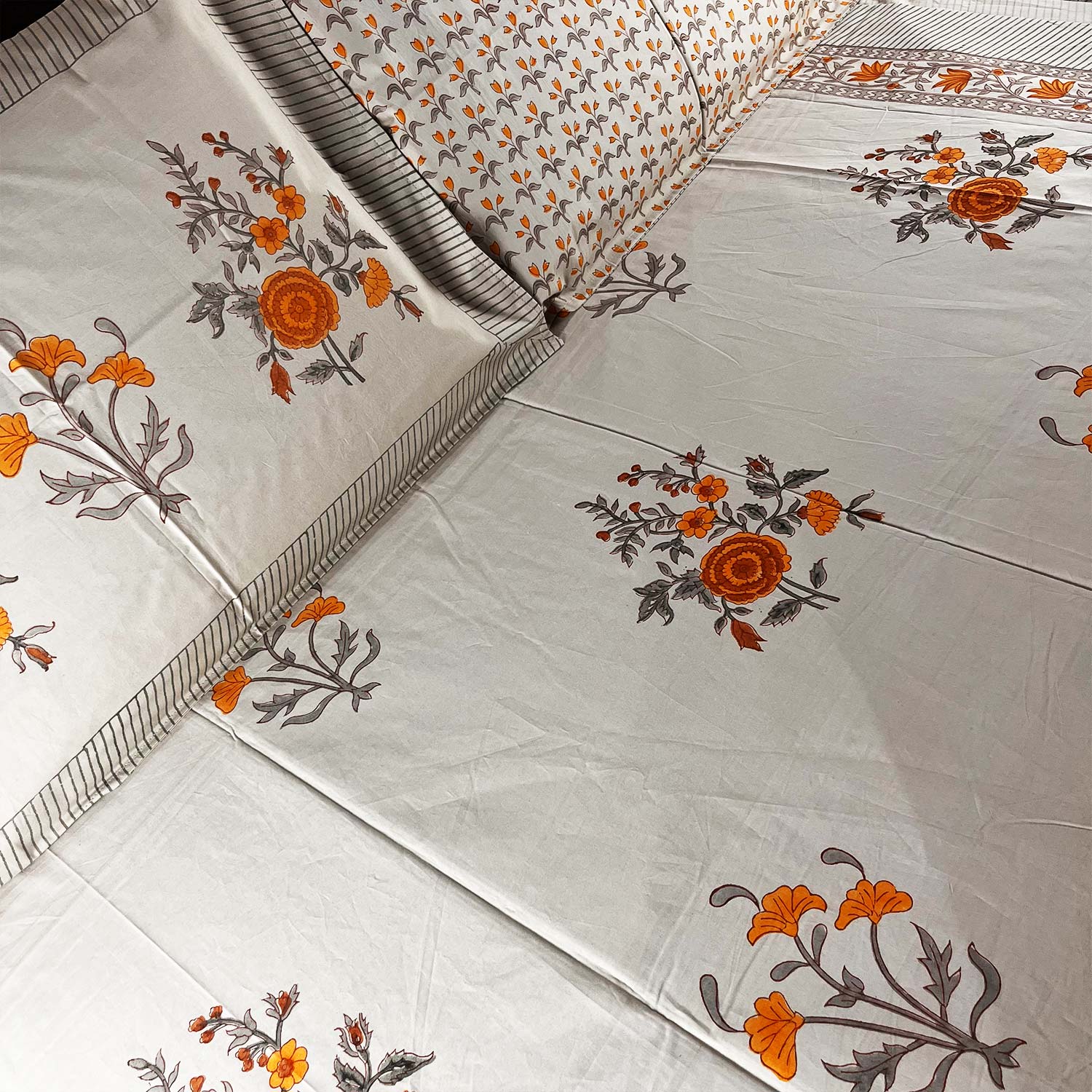 White and Yellow Floral Block Printed Cotton Double Bedsheet Set With 2 Pillow Covers - 108 inches x 108 inches