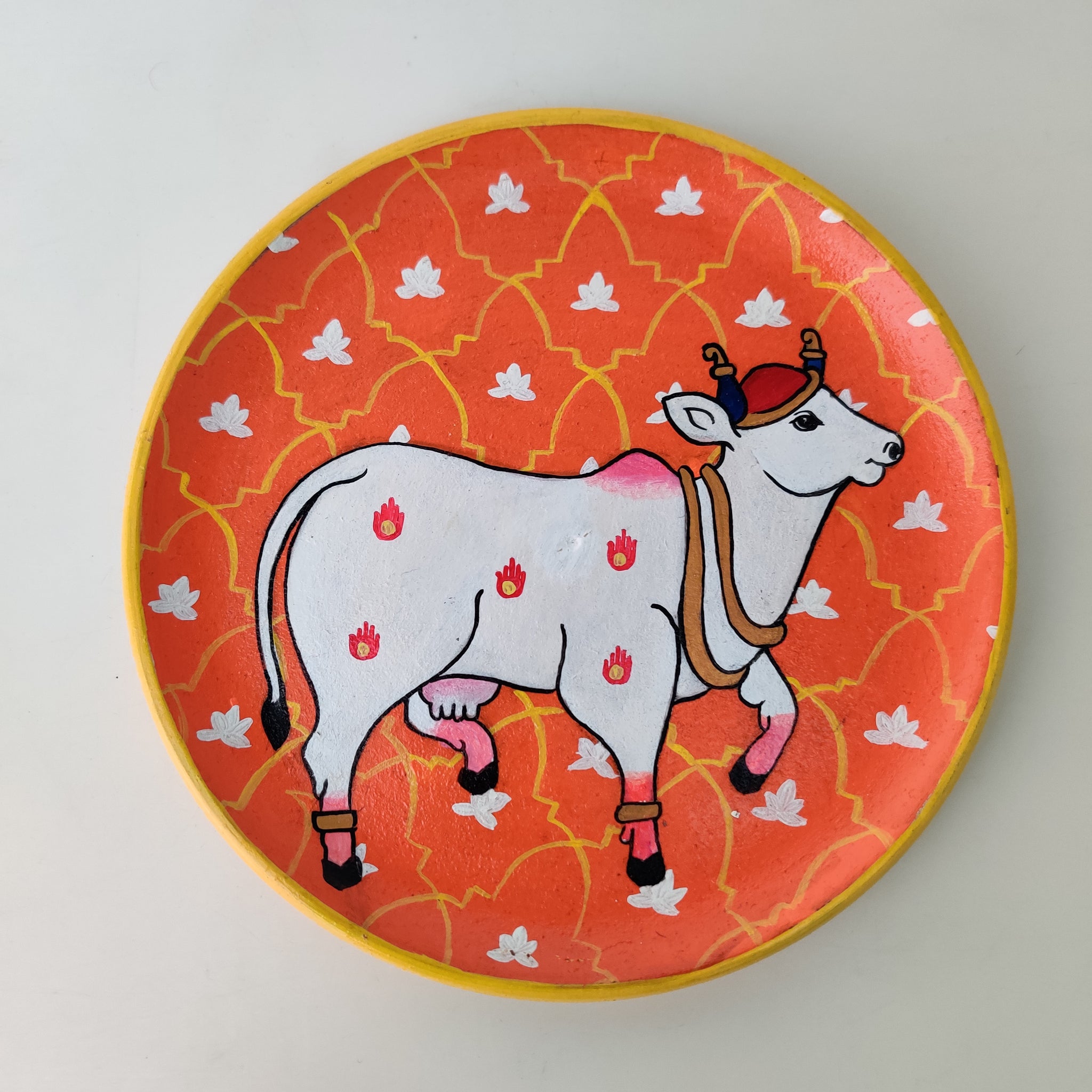 Orange & White Traditional Cow Hand-painted Wall Plate (Diameter - 10 inches)
