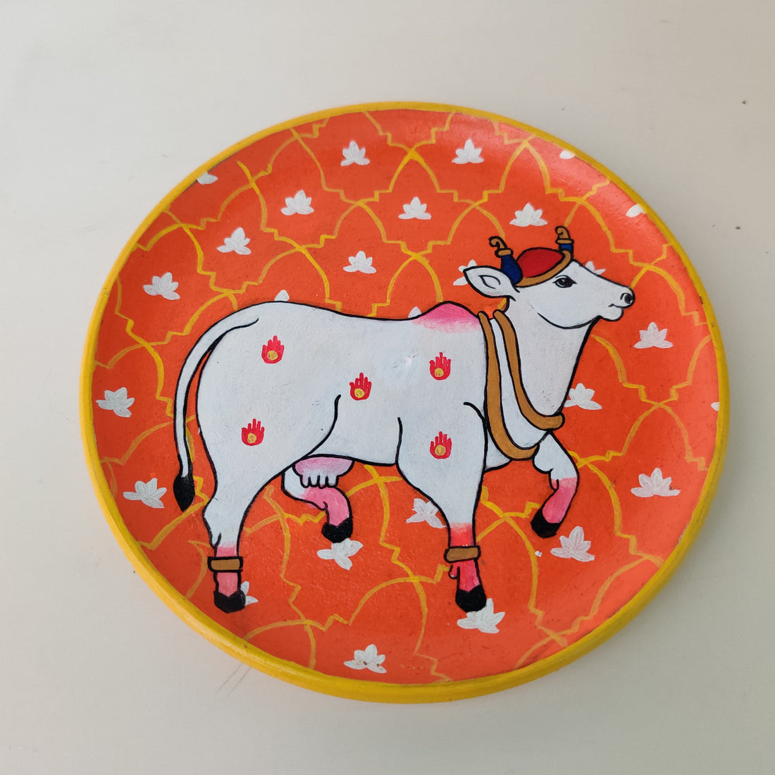 Orange & White Traditional Cow Hand-painted Wall Plate (Diameter - 10 inches)