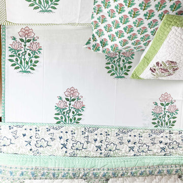 Green and pink flowers printed bedsheet